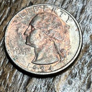 1994 US Quarter Coin with a Copper color rare